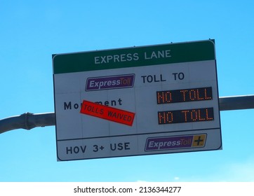 Monument, CO USA - March 9, 2022: Highway Street Sign For Express Toll Lane. Tolls Waived. No Charge. Free Use Of Toll Lane.