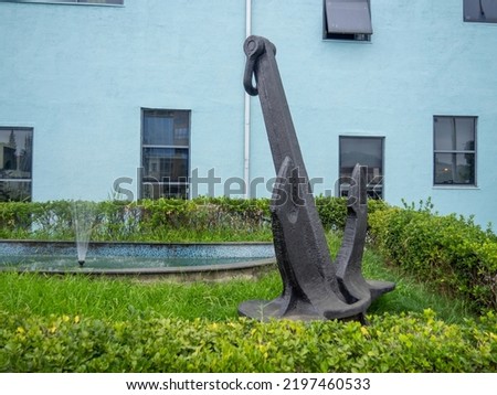 Monument in the form of a ship's anchor. Maritime department. Unusual monument
