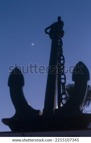 Monument in the form of a ship's anchor and the Moon