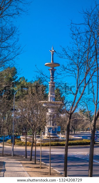Monument of Juan de Villanueva fountain at\
Parque del Peste of park of the west in Madrid Spain near the\
Teleférico cable car tourist\
attraction.