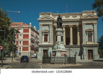 Monument On Street In Front The West Facade Of Casón Del Buen Retiro, An Annex Of The Prado Museum Complex In Madrid. Capital Of Spain This Charming Metropolis Has Vibrant And Intense Cultural Life.