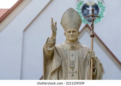 Monument to Pope Jan Pawel II near the Catholic Church on the street of Truskavets city, Ukraine, close up. Pope John Paul II statue