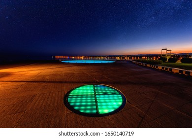 Monument to the sun or Greeting to the sun (Pozdrav suncu), a circle from glass solar plates in Zadar at night, Croatia. Scenic landscape of popular tourist attraction, outdoor travel background - Shutterstock ID 1650140719