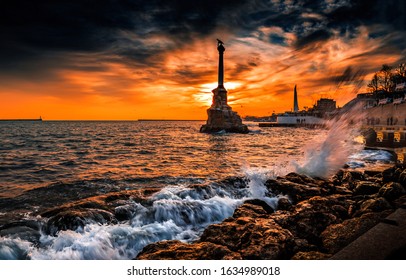 Monument To Sunken Ships In Black Sea Water. Sunset Sevastopol City, Crimea, Russia