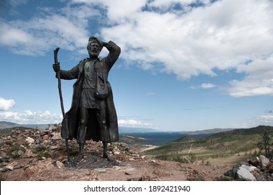 Monument to a vagabond on the shore of Lake Baikal on the way to Olkhon in summer on a sunny day. The author of the sketch is the sculptor Tsydenzhap Tsyzhipov