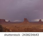 Monument Valley Navajo Tribal Park in Arizona, USA. View of a storm over the Sentinel Mesa, West Mitten Butte, East Mitten Butte, Merrick Butte, the Elephant Butte Monuments and Mitchell Mesa.