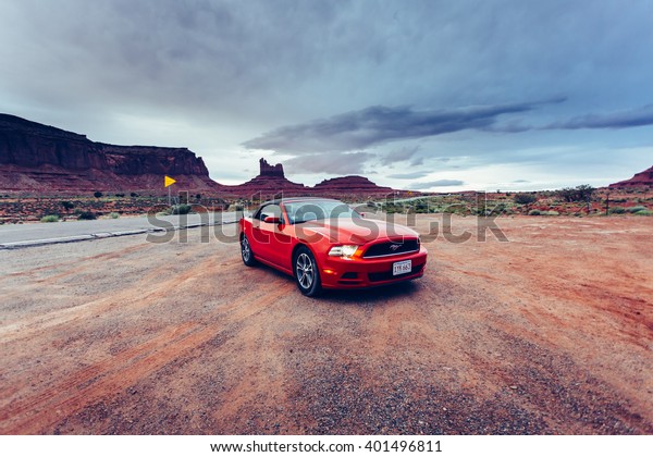 MONUMENT VALLEY ,UTAH, USA JUNE 6, 2015: Photo of\
a Ford Mustang Convertible 2012 version at Monument Valley,Utah,\
USA. The fifth generation began with the 2005 model year to\
2014.TONED Image.