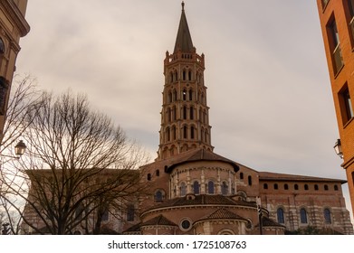 Monumental Abside (back) And Bell Tower Of The Basilica Of Saint-Sernin, A Medieval UNESCO World Heritage Site In Toulouse, France, And The Biggest Romanesque Church In Europe, On Saint James Way