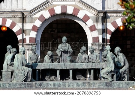 Monumental Cemetery.  Campari tomb by Giannino Castiglioni.The Last Supper, Jesus breaking bread. Bronze.  Milan. Italy. 