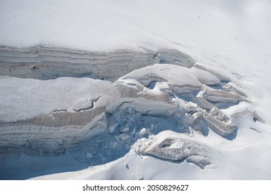 A Monumental Crevasse In A Glacier, Aerial View.