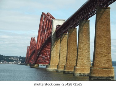 Monumental Forth bridge from European Queensferry town near Edinburgh in Scotland, United Kingdom, clear blue sky in 2016 cold summer day on August. - Powered by Shutterstock