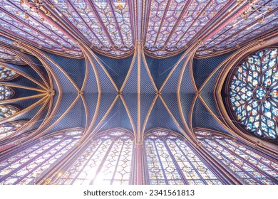 Monumental interior of Sainte-Chapelle with stained glass windows, upper level of royal chapel in the Gothic style. Palais de la Cite, Paris, France - Powered by Shutterstock