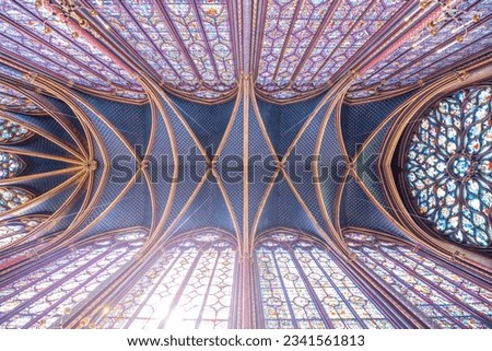 Monumental interior of Sainte-Chapelle with stained glass windows, upper level of royal chapel in the Gothic style. Palais de la Cite, Paris, France