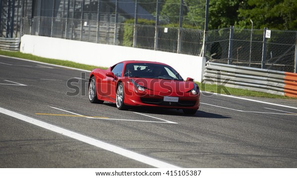 Monza, Italy - May 03, 2016 : Famous\
sports car at Monza during a fast driving\
course.