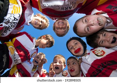 MONZA, ITALY-OCTOBER 25, 2009: young rugby players under 8 of the ASD Rugby Monza team, embracing during a mini rugby tournament, in Monza.