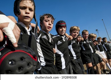 MONZA, ITALY-OCTOBER 25, 2009: young rugby players under 10 of the Petrarca Padova Rugby team, embracing at the end of the match, during a mini rugby tournament, in Monza.