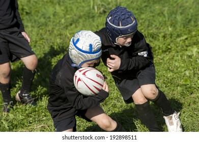 MONZA, ITALY-OCTOBER 25, 2009: young rugby players under 8 of the Amatori Milano Rugby team, playing during a mini rugby tournament, in Monza.