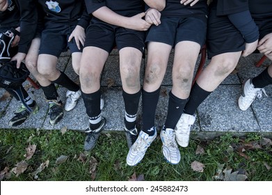 MONZA, ITALY-OCTOBER 25, 2010: children 's legs after played a mini rugby match, in Monza.