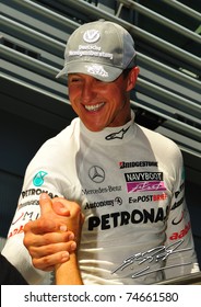 MONZA - SEPTEMBER 11: Michael Schumacher from Germany and Mercedes GP whit signature attends press after driving on september 11, 2010 in monza, italy, formula 1