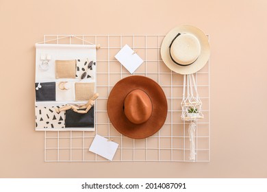 Moodboard With Hats, Organizer And Wooden Mannequin On Wall