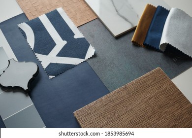 Moodboard. Material samples. Blue, gray, white, black, gold, warm wood.                       - Shutterstock ID 1853985694