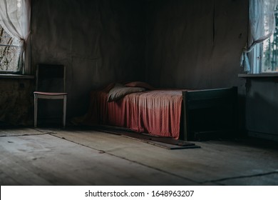 Moody Bedroom With Red Bedsheet