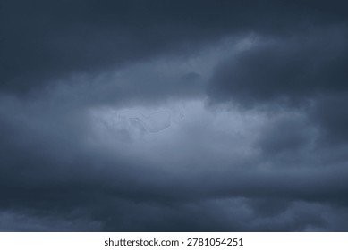 Moody dark dramatic clouds before thunderstorm. Sullen and overcast sky background