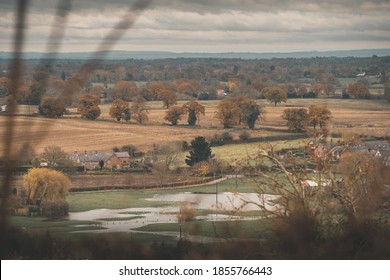 Moody Dramatic Shot Of Small Farm House Surrounded By Farmland Fall Autumn In UK