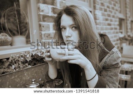 moody emo girl next door looking at camera