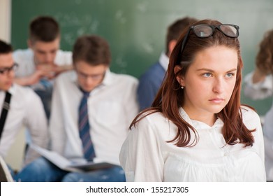 Moody Girl Student Standing In A Class