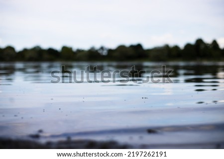 Moody photography of lake water surface.