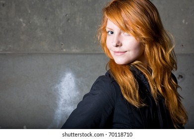 Moody Portrait Of A Beautiful Young Redhead Girl.