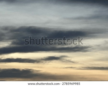 Moody sunset clouds creating natural evening sky background and atmospheric outdoor weather environment