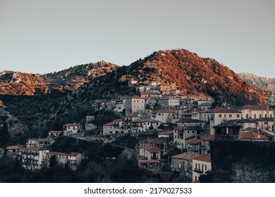 Moody Sunset In A Greek Village