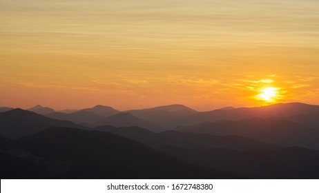 Moody Sunset In The Mountains