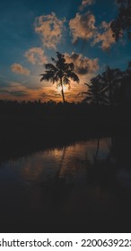 Moody Sunset Over The River Side 