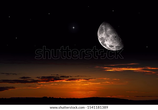 Moon against the\
background of a bright cloud . Half moon .  Crescent moon with\
beautiful sunset background . Generous Ramadan . Light from sky .\
Religion background . NASA\
