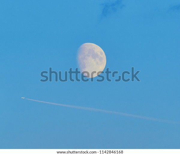 moon and airplane in the
sky