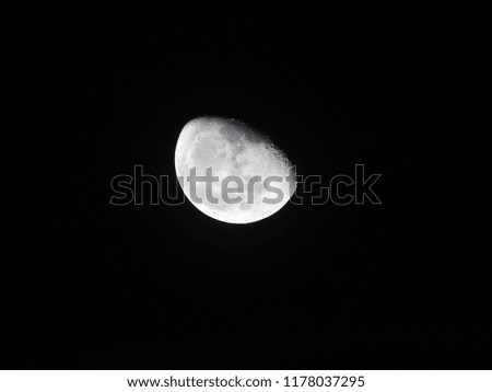Moon almost 60% visible, Lunar. It is an astronomical body that orbits planet Earth.
