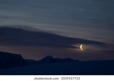 Moon in Antarctica. Night view of Antarctica.  - Powered by Shutterstock