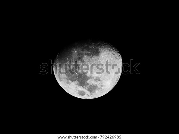 The Moon is an\
astronomical body that orbits planet Earth, being Earth\'s only\
permanent natural satellite. It is the fifth-largest natural\
satellite in the Solar\
System