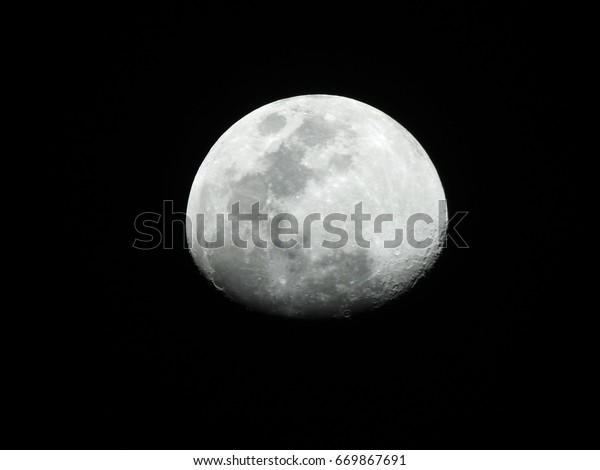 Moon
Background / The Moon is an astronomical body that orbits planet
Earth, being Earth's only permanent natural satellite. It is the
fifth-largest natural satellite in the Solar
System