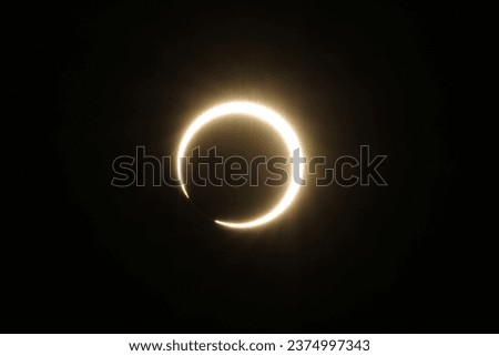 The moon begins to move off the solar disk during an annular eclipse of the sun on October 14, 2023, near Klamath Falls, OR. 