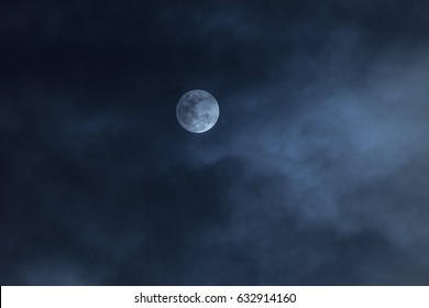 Moon Behind Foggy Sky