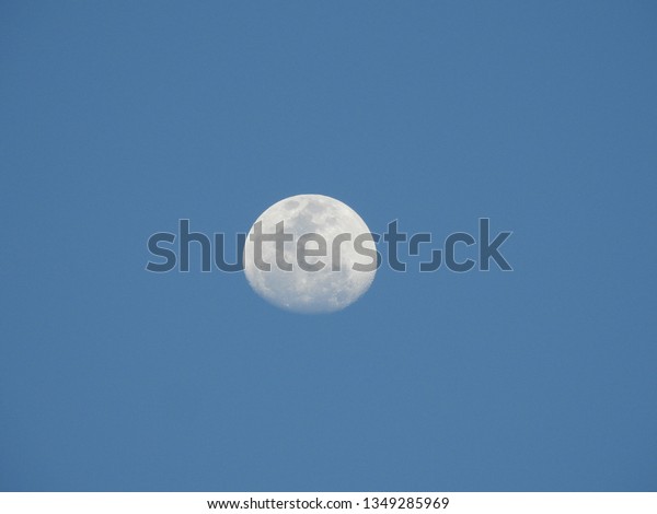 Moon in the blue
sky.