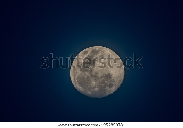 moon and blue sky at\
night