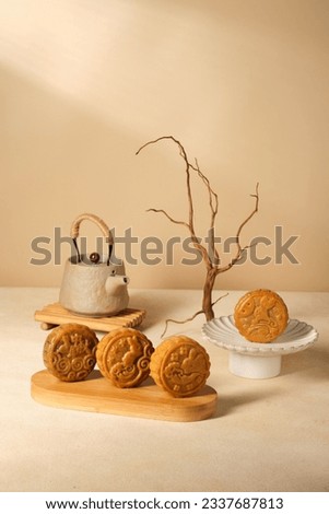 Moon Cake  Mid Autumn Festival with teapot ,chinese style photograph,portrait format