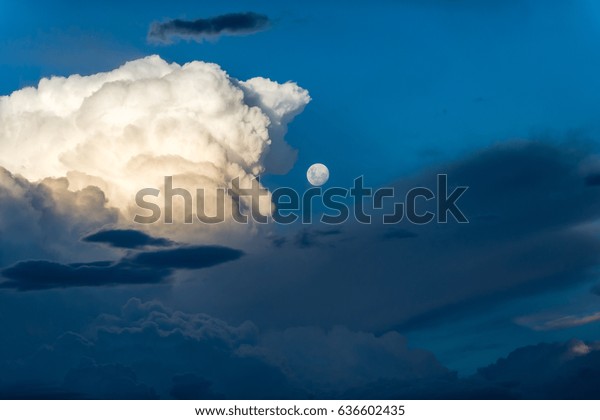 Moon and cloud blue sky in\
evening