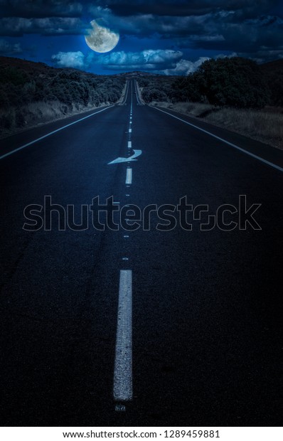 Moon and clouds in the night. Moonlight and
road background. Dark blue
backdrop.