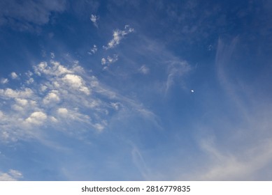 moon with clouds at sunet